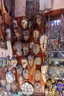 Wall with traditional African wooden masks, decorative and artistic