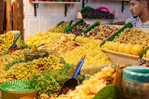 Colourful range of market stands with a variety of fruits and vegetables