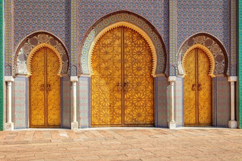 Three richly decorated doors with detailed mosaics and ornaments