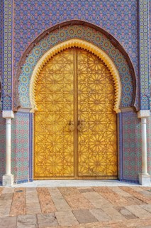 Decorated palace door with colorful mosaic patterns and architectural details