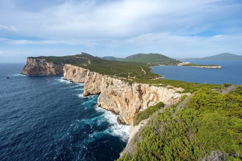 View of steep cliffs by the sea, coastal landscape, cliffs on the Capo Caccia headland, Alghero,