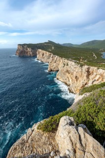 View of steep cliffs by the sea, coastal landscape, cliffs on the Capo Caccia headland, Alghero,