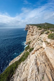 Steep cliffs by the sea, Belvedere Foradada, cliffs on the Capo Caccia headland, Alghero, Sardinia,