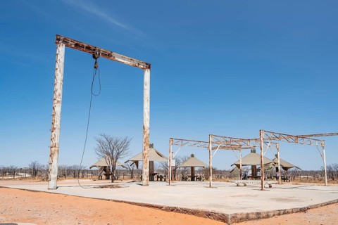 Office for former killing of elephants to combat overpopulations, Olifantsrus Camp, Waterhole,