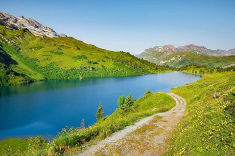 Hiking trail along Lake Engstlensee, Engstlenalp, Canton of Bern, Switzerland