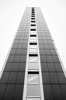 Modern architecture, geometric lines photographed in black and white, former water tower of the