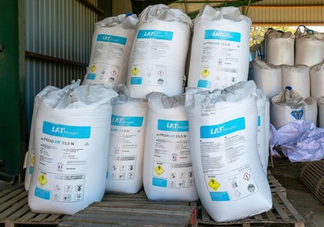 MYPREMIAN ammonium nitrate LAR nitrogen fertiliser bags stored in farm barn, Suffolk, England, UK