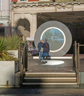People on the Cornhill in the town centre view the first ever UK Portal in Ipswich, Suffolk,