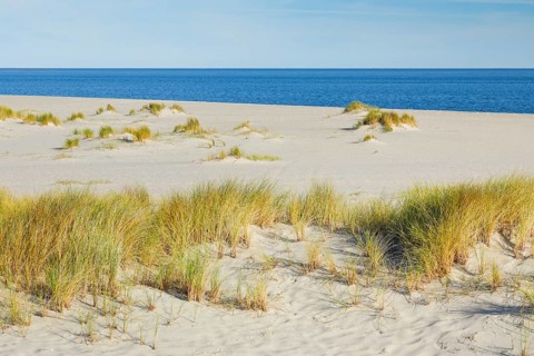 Sand dunes and an elbow beach on the island of Sylt, Germany