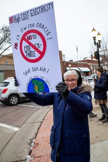 Saline, Michigan USA - 1 December 2025 - Rural Michigan residents rally against the $7 billion