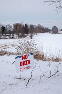Saline, Michigan USA - 1 December 2025 - A sign on a rural Michigan road opposes a planned $7