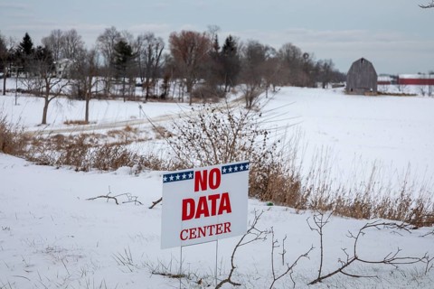 Saline, Michigan USA - 1 December 2025 - A sign on a rural Michigan road opposes a planned $7