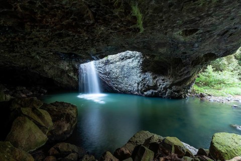Natural Bridge Springbrook National Park Waterfall in the Basalt Cave, Queensland Gondwana