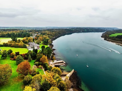 Autumn over Plas Newydd House from a drone, Gardens and Parkland, Llanfairpwllgwyngyll, Anglesey,