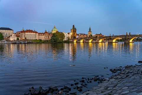 Old Town of Prague with Vltava River, Charles Bridge and Old Town Bridge Tower at dusk, Prague,