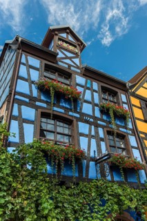Decorated timber-frame house in the historic old town of Riquewihr, Ellsass
