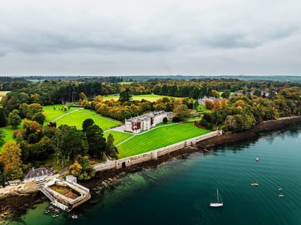 Autumn over Plas Newydd House from a drone, Gardens and Parkland, Llanfairpwllgwyngyll, Anglesey,