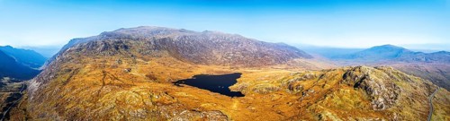 Autumn colours over Llyn Cwmffynnon and Miner's Track, Start Point, road A4086 from a drone,
