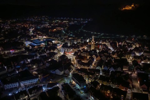 Panoramic view of a city at night with illuminated streets and buildings, Nagold, Calw district,