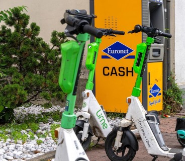 Electric scooters and rental bikes on public roads, Berlin, Germany