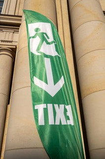 Green exit banners at the Schlüter Hof exit in the Humboldt Forum, Berlin, Germany