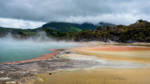 The champagne pool in the Waiotapu geothermal area (Wai-O-Tapu) . orange and yellow. Waiotapu,