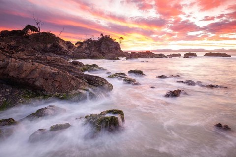 Sunset at Fisherman's Lookout. Dramatic waves and coastal scenery at The Pass, New South Wales,