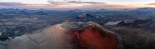 Caldera Colorada volcano, picturesque volcanic landscape with volcanic craters at sunrise, Los
