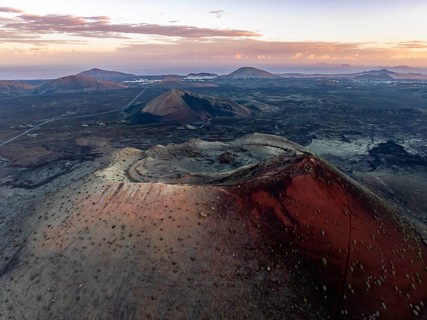 Caldera Colorada volcano, picturesque volcanic landscape with volcanic crater at sunrise, Parque