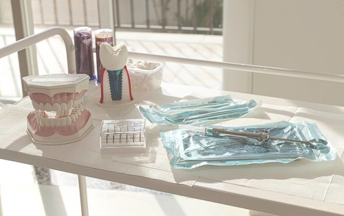 Sterile medical instruments, lying on a tray in protective packaging, dentist's instruments,