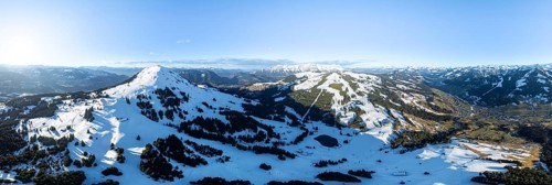 Wonderful winter landscape with Hohe Salve, blue sky and snow, mountains and mountain valley,
