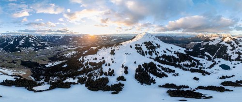 Sunset, alpine panorama, fantastic winter landscape with Hohe Salve, blue sky and snow, mountains