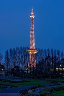Red illuminated Berlin radio tower, half-timbered steel building by architect Heinrich Straumer,