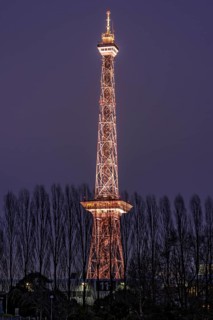 Red illuminated Berlin radio tower, half-timbered steel building by architect Heinrich Straumer,