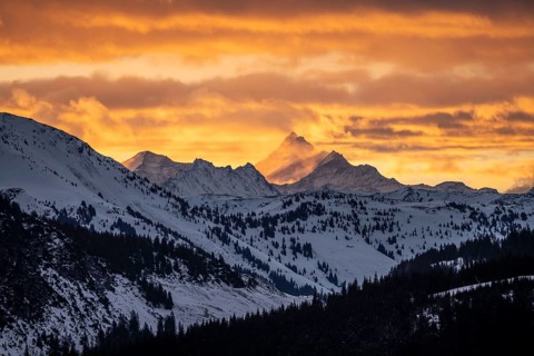Grossglockner peaks at sunset in winter, spectacular cloudy skies, Hochbrixen, Brixen im Thale,