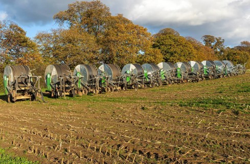 Rainstar E31 irrigation sprayer machinery in field, Shottisham, Suffolk, England, UK