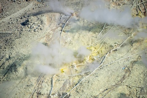 Steaming fumaroles in the Owakudani geothermal area at Komagatake volcano, Hakone, Japan