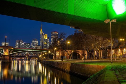 The lights of Frankfurt's banking skyline glow in the evening, Frankfurt am Main, Hesse, Germany