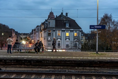 Essen-Steele S-Bahn station, passengers waiting for the train late afternoon, in autumn, Essen,