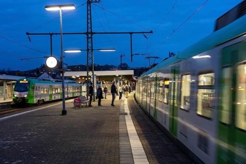 Essen-Steele S-Bahn station, passengers waiting for the train late afternoon, in autumn, Essen,