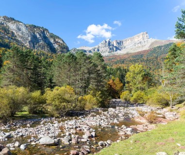 Mountain landscape view river at Selva de Oza, Valle de Hecho, Pyrenees Mountains, Huesca province,