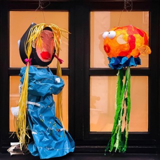 Homemade lanterns for the Martin procession in front of a window in the evening, Old Town, Kempen,