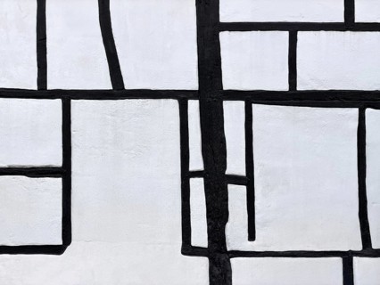 Unusual framework of irregularly arranged rectangular wooden beams in three compartments,