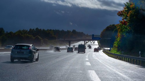 Cars on rain-wet A9 motorway during a thunderstorm, Hof, Upper Franconia, Bavaria, Germany