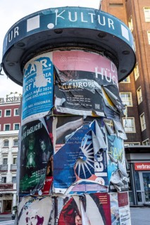 Advertising column for cultural projects, advertising for events, unkempt, torn and exfoliated