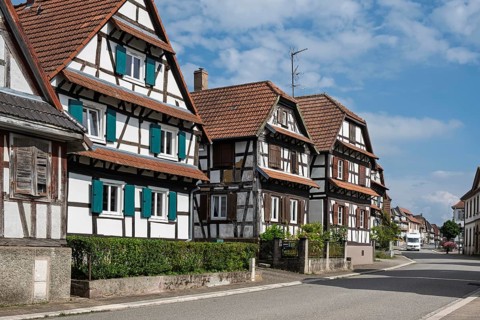 Street with traditional half-timbered houses, Betschdorf pottery village, Alsace, France