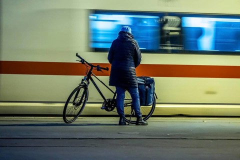 Cyclists waiting for the train, in Essen main station, on the platform, North Rhine-Westphalia,