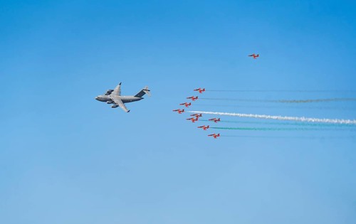 The Indian Air Force aerobatic team performs during an air show as part of the 93rd Air Force Day