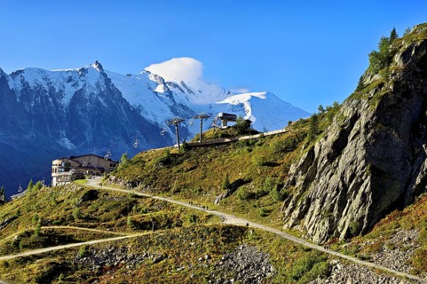 Mountain station of the La Flégère cable car, with the snow-covered Mont Blanc massif at the back,