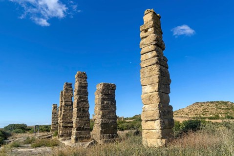 Stone columns of ancient aqueduct, Roman site of Los Banales, near Layana, Zaragoza province,